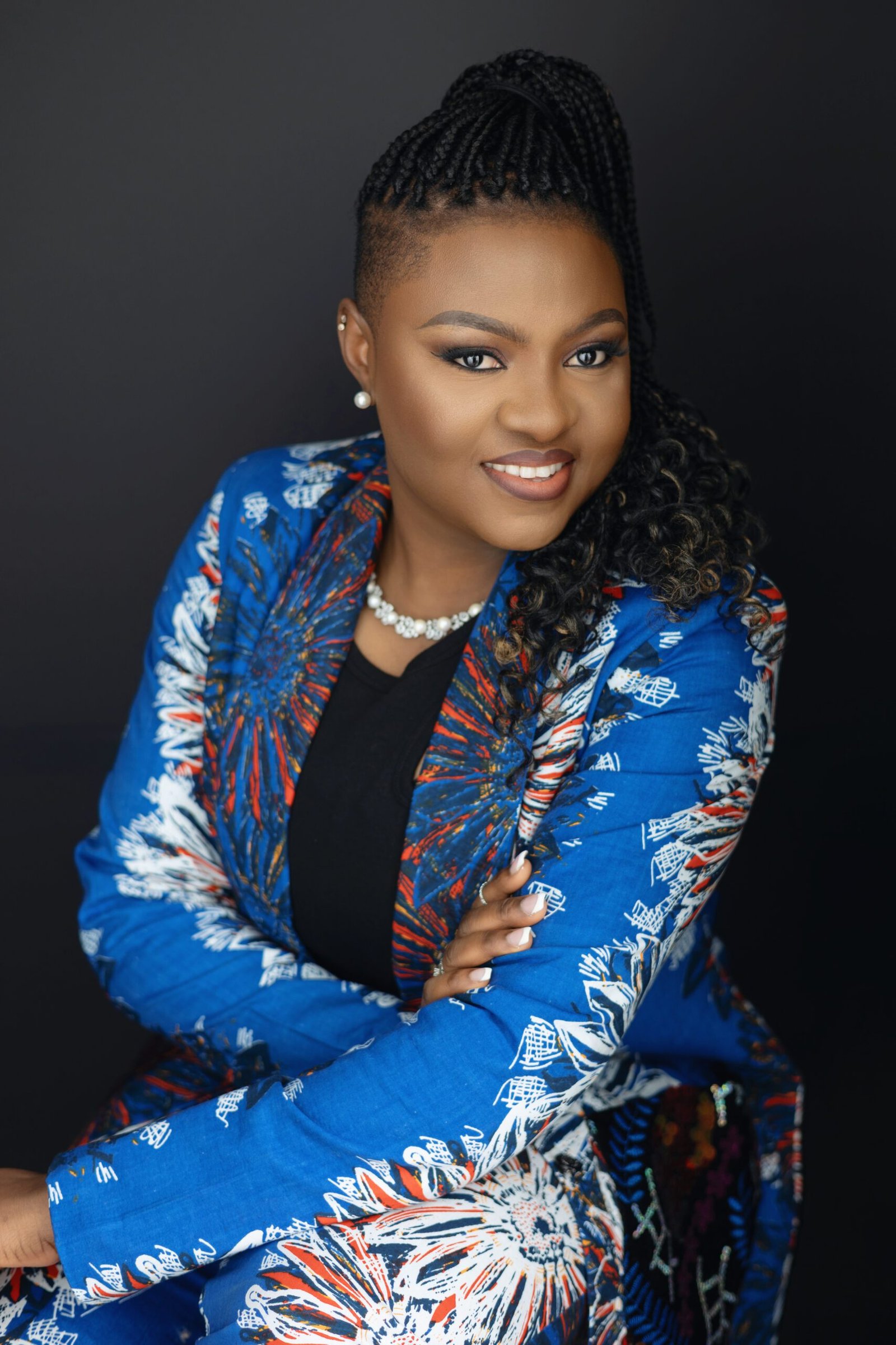 headshot of deju in gold circle crop